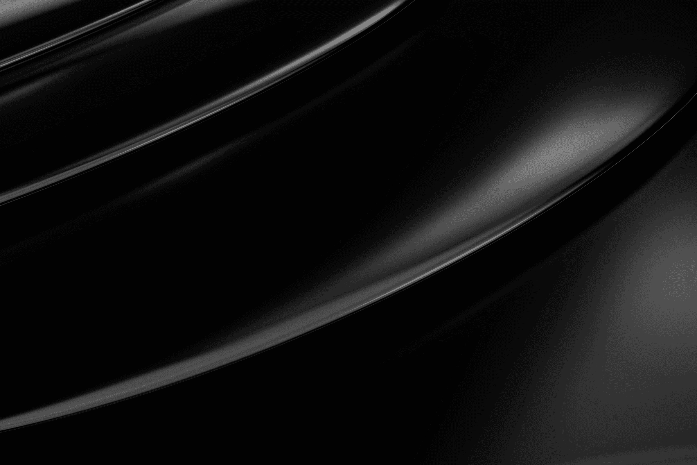 Abstract dark flowing curved surface with soft highlights